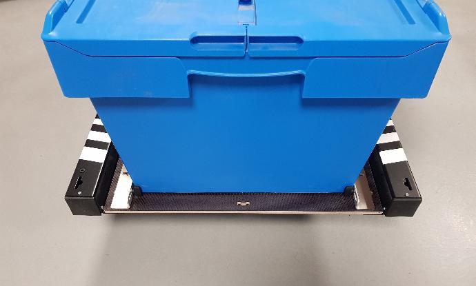Transport of boxes on the Runner