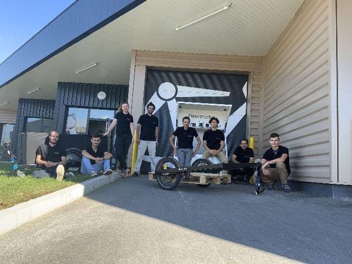 FlexiModal's team, group of people wearing a black polo shirt