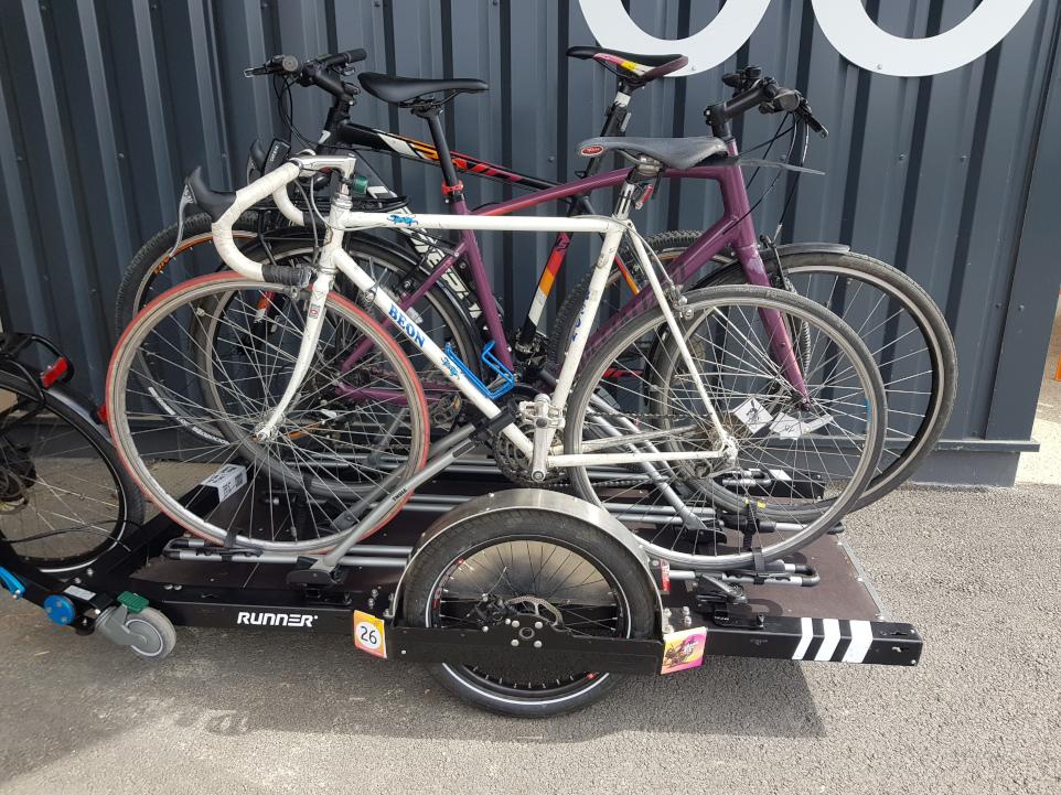 Three bikes on a bike trailer