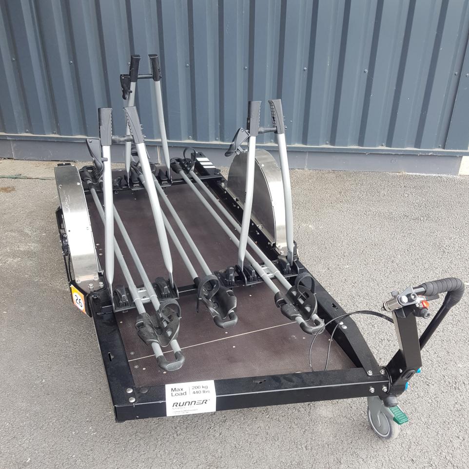 Three bike clamps on a bike trailer